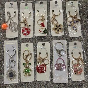 Resellers lot of 10 rhinestone keychains/bag charms. Great variety all new.